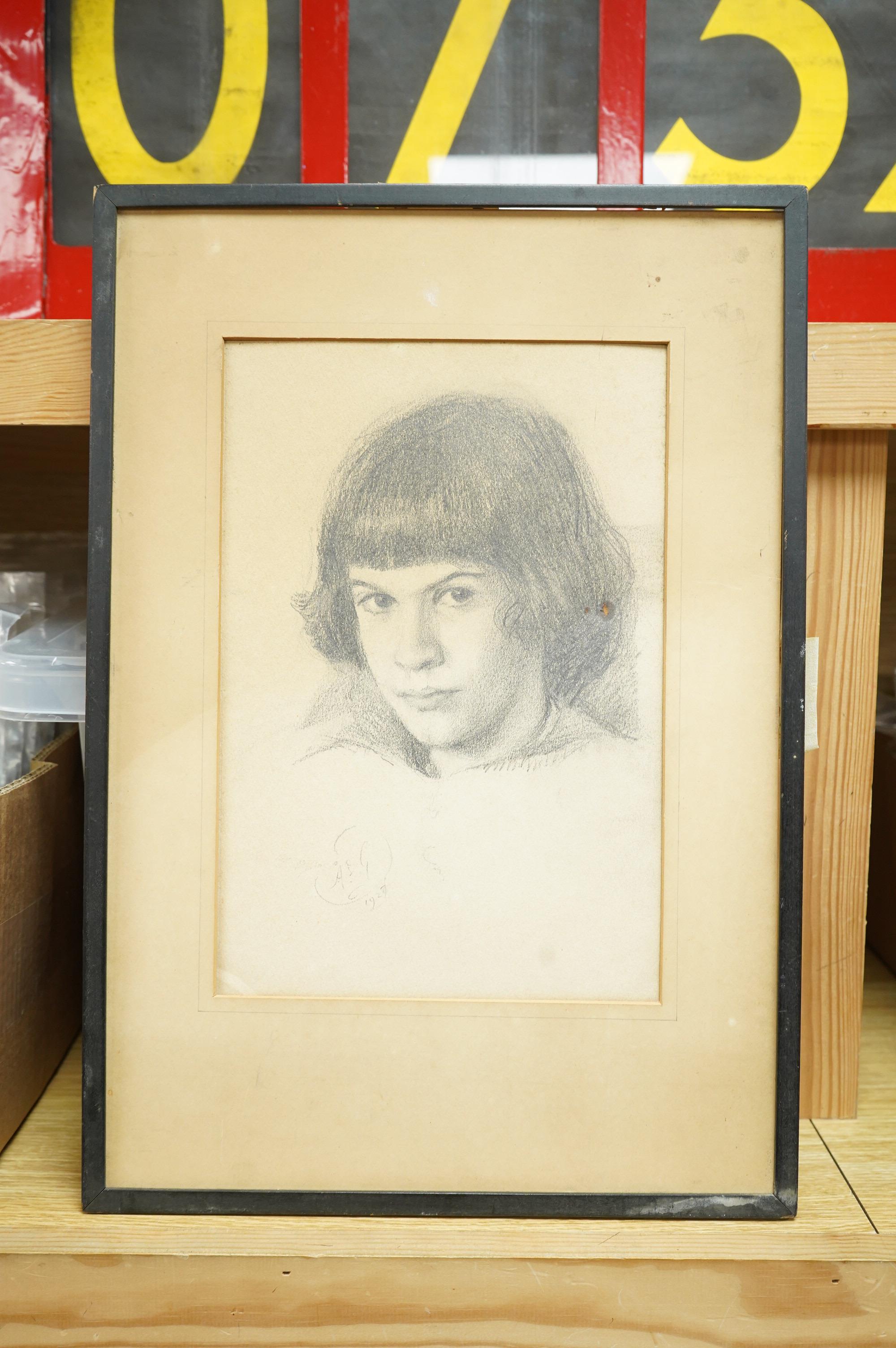 Early 20th century, English school, head study of a young girl, pencil, indistinctly signed, dated 1929, 27 x 18cm